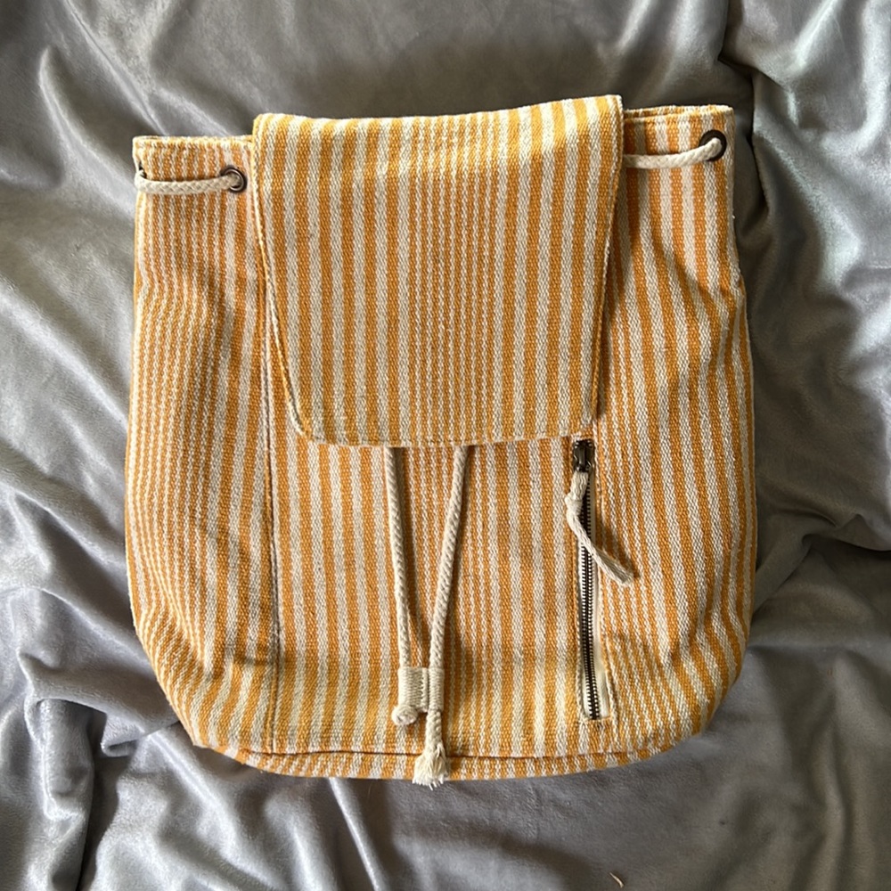 Soft cotton backpack with lots of pockets and zippers made by Universal thread